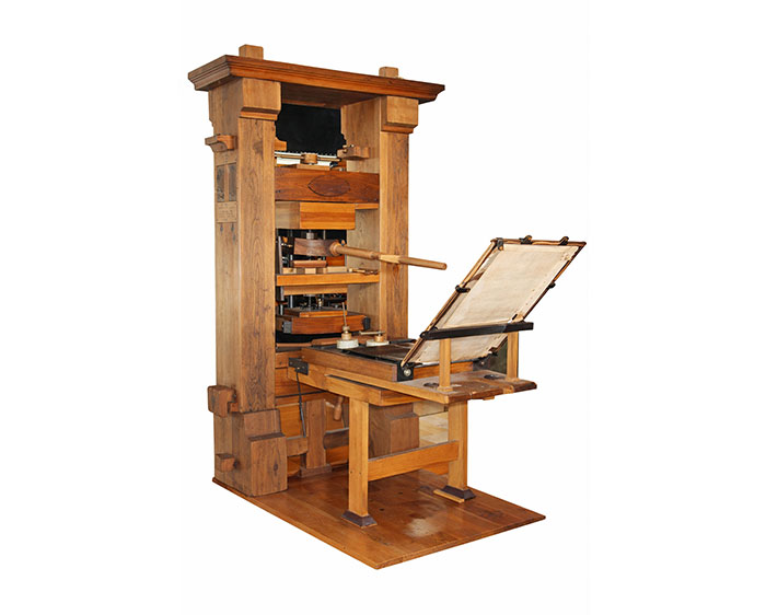 Hand-operated wooden printing press