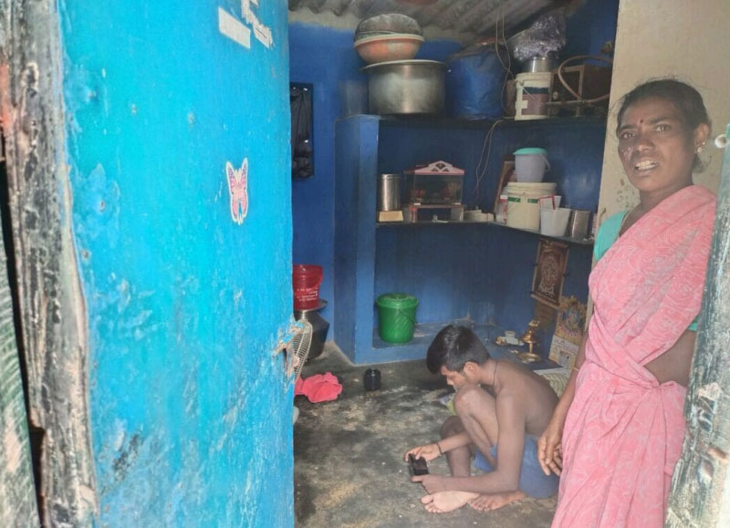 Inside a compact home in the Tsunami Quarters, limited space makes it difficult for children to find a quiet place to study.